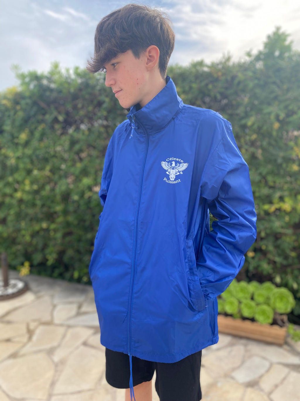 Coupe-vent bleu logo blanc